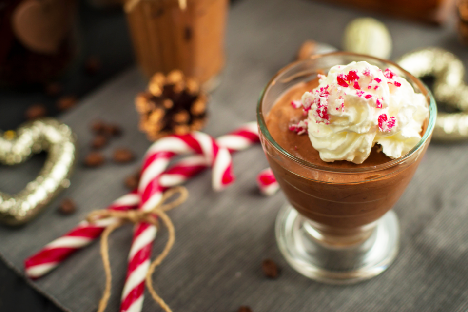 pudding in a bowl with whipped cream topping